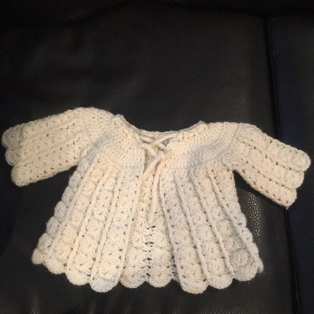 Light tan/creme knitted sweater for baby